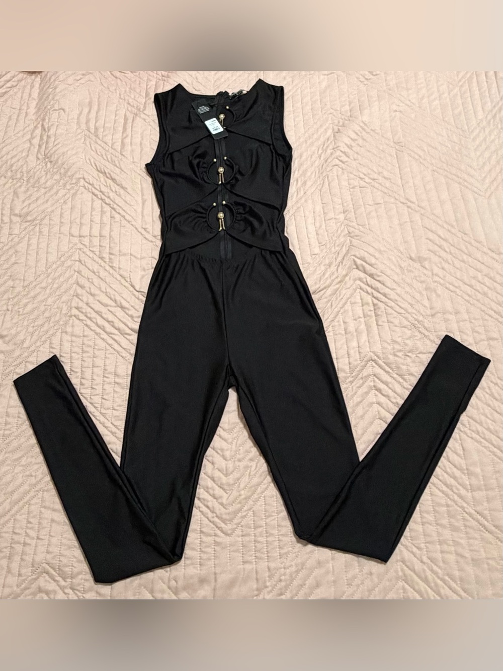 Fashion Nova Black Sleeveless Cutout Jumpsuit with Ring Details